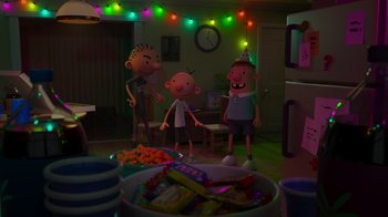Movie still from “Diary of a Wimpy Kid: Rodrick Rules” (2022), directed by Gino Nichele – A group of people standing in a room with a bowl of candy; Wide shot, High angle