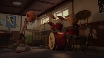 Movie still from “Diary of a Wimpy Kid: Rodrick Rules” (2022), directed by Gino Nichele – A group of people playing drums in a room; Wide shot, High angle