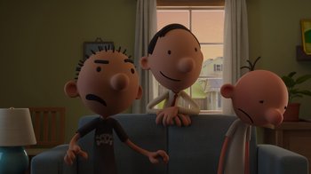 Movie still from “Diary of a Wimpy Kid: Rodrick Rules” (2022), directed by Gino Nichele – A group of people standing next to each other in front of a window; Medium shot, Over the shoulder angle