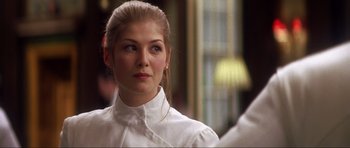 Movie still from “Die Another Day” (2002), directed by Lee Tamahori – A beautiful young lady wearing a white shirt; Close Up shot, Over the shoulder angle