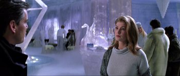 Movie still from “Die Another Day” (2002), directed by Lee Tamahori – A woman standing in front of a large ice sculpture; Medium shot, Over the shoulder angle
