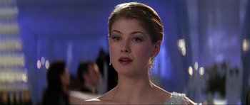 Movie still from “Die Another Day” (2002), directed by Lee Tamahori – A person wearing a dress; Close Up shot, Low angle