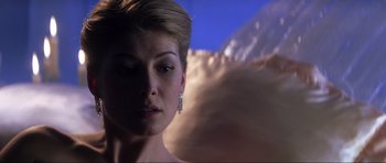 Movie still from “Die Another Day” (2002), directed by Lee Tamahori – A person wearing a dress; Close Up shot, Low angle