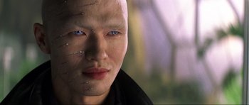 Movie still from “Die Another Day” (2002), directed by Lee Tamahori – A person with blue eyes; Close Up shot, High angle
