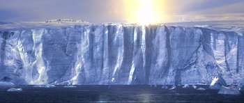 Movie still from “Die Another Day” (2002), directed by Lee Tamahori – The sun is shining over a large cliff of ice; Extreme Wide shot, High angle