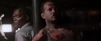 Movie still from “Die Hard with a Vengeance” (1995), directed by John McTiernan – A person with blood all over his face; Close Up shot, Low angle