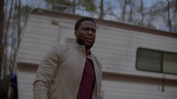 Movie still from “Die Hart” (2023), directed by Eric Appel – A person wearing a jacket; Medium shot, Over the shoulder angle