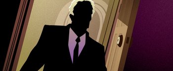 Movie still from “Die in a Gunfight” (2021), directed by Collin Schiffli – A man in a suit and tie standing in front of a door; Close Up shot, Low angle