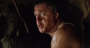 Movie still from “War of the Worlds” (2005), directed by Steven Spielberg – A person with wet hair; Close Up shot, Low angle