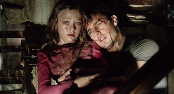 Movie still from “War of the Worlds” (2005), directed by Steven Spielberg – A man and a little girl with blood all over them; Close Up shot, Low angle
