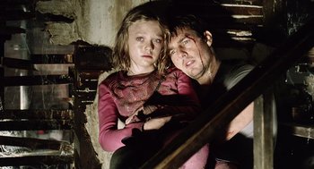 Movie still from “War of the Worlds” (2005), directed by Steven Spielberg – A man and a little girl with blood on them; Medium shot, Low angle
