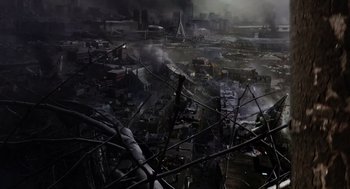 Movie still from “War of the Worlds” (2005), directed by Steven Spielberg – An aerial view of a city with smoke billowing from the sky; Extreme Wide shot, High angle