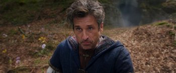 Movie still from “Disenchanted” (2022), directed by Adam Shankman – A person with a beard; Close Up shot, Over the shoulder angle