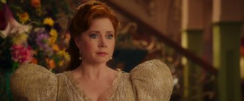 Movie still from “Disenchanted” (2022), directed by Adam Shankman – A person wearing a dress; Close Up shot, Over the shoulder angle