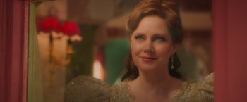 Movie still from “Disenchanted” (2022), directed by Adam Shankman – A person wearing a dress; Close Up shot, Over the shoulder angle