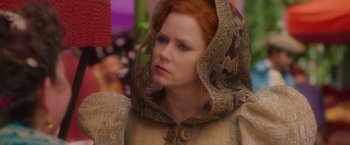 Movie still from “Disenchanted” (2022), directed by Adam Shankman – A red haired woman wearing a medieval dress; Close Up shot, Over the shoulder angle