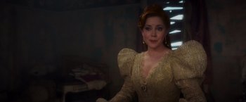 Movie still from “Disenchanted” (2022), directed by Adam Shankman – A person wearing a dress; Close Up shot, Over the shoulder angle