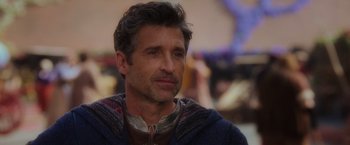 Movie still from “Disenchanted” (2022), directed by Adam Shankman – A person wearing a neck tie; Close Up shot, Over the shoulder angle