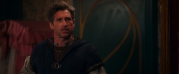 Movie still from “Disenchanted” (2022), directed by Adam Shankman – A person wearing a costume; Close Up shot, Over the shoulder angle