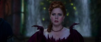 Movie still from “Disenchanted” (2022), directed by Adam Shankman – A person wearing a dress; Close Up shot, Over the shoulder angle