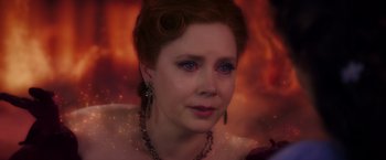 Movie still from “Disenchanted” (2022), directed by Adam Shankman – A person wearing a necklace; Close Up shot, Over the shoulder angle