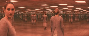 Movie still from “Divergent” (2014), directed by Neil Burger – A group of people standing in front of a mirror; Wide shot, High angle