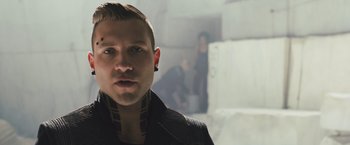Movie still from “Divergent” (2014), directed by Neil Burger – A person wearing a jacket; Close Up shot, Low angle