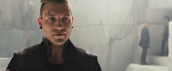 Movie still from “Divergent” (2014), directed by Neil Burger – A person wearing a black jacket; Close Up shot, Low angle