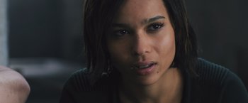 Movie still from “Divergent” (2014), directed by Neil Burger – A woman's face in a dark room; Close Up shot, Low angle