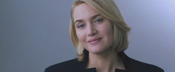 Movie still from “Divergent” (2014), directed by Neil Burger – A person with blonde hair; Close Up shot, Low angle