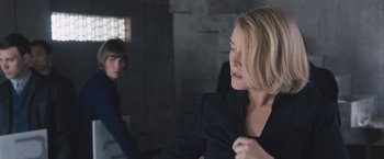 Movie still from “Divergent” (2014), directed by Neil Burger – A woman in a black jacket and a man in a black jacket; Medium shot, Over the shoulder angle