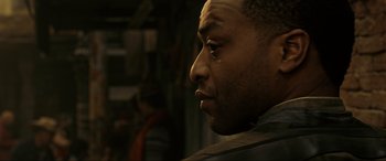 Movie still from “Doctor Strange” (2016), directed by Scott Derrickson – A man's face in the dark; Close Up shot, Over the shoulder angle