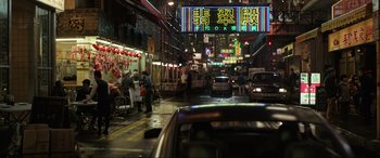 Movie still from “Doctor Strange” (2016), directed by Scott Derrickson – A street scene with cars parked on the side of the road; Extreme Wide shot, High angle
