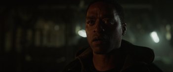 Movie still from “Doctor Strange” (2016), directed by Scott Derrickson – A person looking at the camera; Close Up shot, Over the shoulder angle