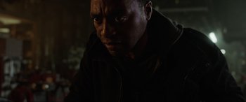 Movie still from “Doctor Strange” (2016), directed by Scott Derrickson – A person in a dark room; Close Up shot, Over the shoulder angle