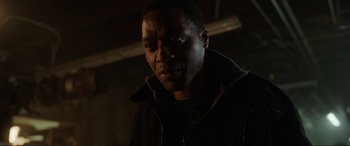 Movie still from “Doctor Strange” (2016), directed by Scott Derrickson – A person in a dark room; Close Up shot, Low angle