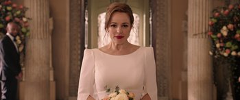 Movie still from “Doctor Strange in the Multiverse of Madness” (2022), directed by Sam Raimi – A woman in a white dress holding a bouquet of flowers; Close Up shot, Over the shoulder angle