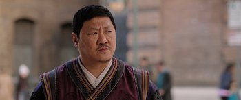 Movie still from “Doctor Strange in the Multiverse of Madness” (2022), directed by Sam Raimi – A person wearing a robe; Close Up shot, Low angle