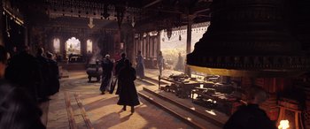 Movie still from “Doctor Strange in the Multiverse of Madness” (2022), directed by Sam Raimi – A group of people standing in a room; Extreme Wide shot, High angle