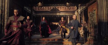 Movie still from “Doctor Strange in the Multiverse of Madness” (2022), directed by Sam Raimi – A group of people dressed in medieval clothing; Wide shot, Low angle