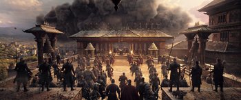 Movie still from “Doctor Strange in the Multiverse of Madness” (2022), directed by Sam Raimi – An image of a group of people that are standing in the dirt; Extreme Wide shot, High angle