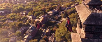 Movie still from “Doctor Strange in the Multiverse of Madness” (2022), directed by Sam Raimi – An aerial view of a person on a rope bridge; Extreme Wide shot, High angle