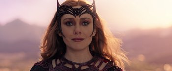 Movie still from “Doctor Strange in the Multiverse of Madness” (2022), directed by Sam Raimi – A person wearing a costume; Close Up shot, Over the shoulder angle