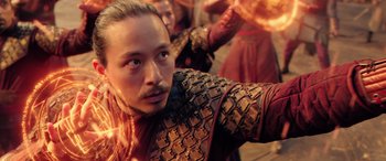 Movie still from “Doctor Strange in the Multiverse of Madness” (2022), directed by Sam Raimi – A person wearing a costume; Close Up shot, Over the shoulder angle