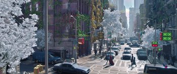 Movie still from “Doctor Strange in the Multiverse of Madness” (2022), directed by Sam Raimi – A painting of a city street with cars parked on the side of the road; Extreme Wide shot, High angle