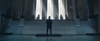 Movie still from “Doctor Strange in the Multiverse of Madness” (2022), directed by Sam Raimi – A man standing in front of a large window; Extreme Wide shot, Low angle