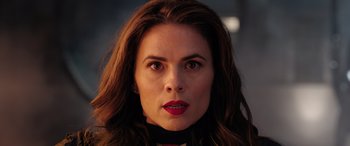 Movie still from “Doctor Strange in the Multiverse of Madness” (2022), directed by Sam Raimi – A person with long brown hair; Close Up shot, Low angle