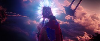 Movie still from “Doctor Strange in the Multiverse of Madness” (2022), directed by Sam Raimi – A man standing in front of a clock in the middle of the night; Medium shot, Low angle