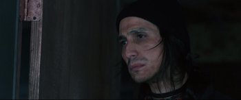 Movie still from “Wind River” (2017), directed by Taylor Sheridan – A person with long black hair; Close Up shot, Over the shoulder angle