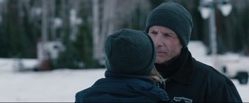 Movie still from “Wind River” (2017), directed by Taylor Sheridan – A man and a woman talking to each other outside; Close Up shot, Over the shoulder angle